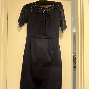 Elegant Navy Dress with Embellished Neckline